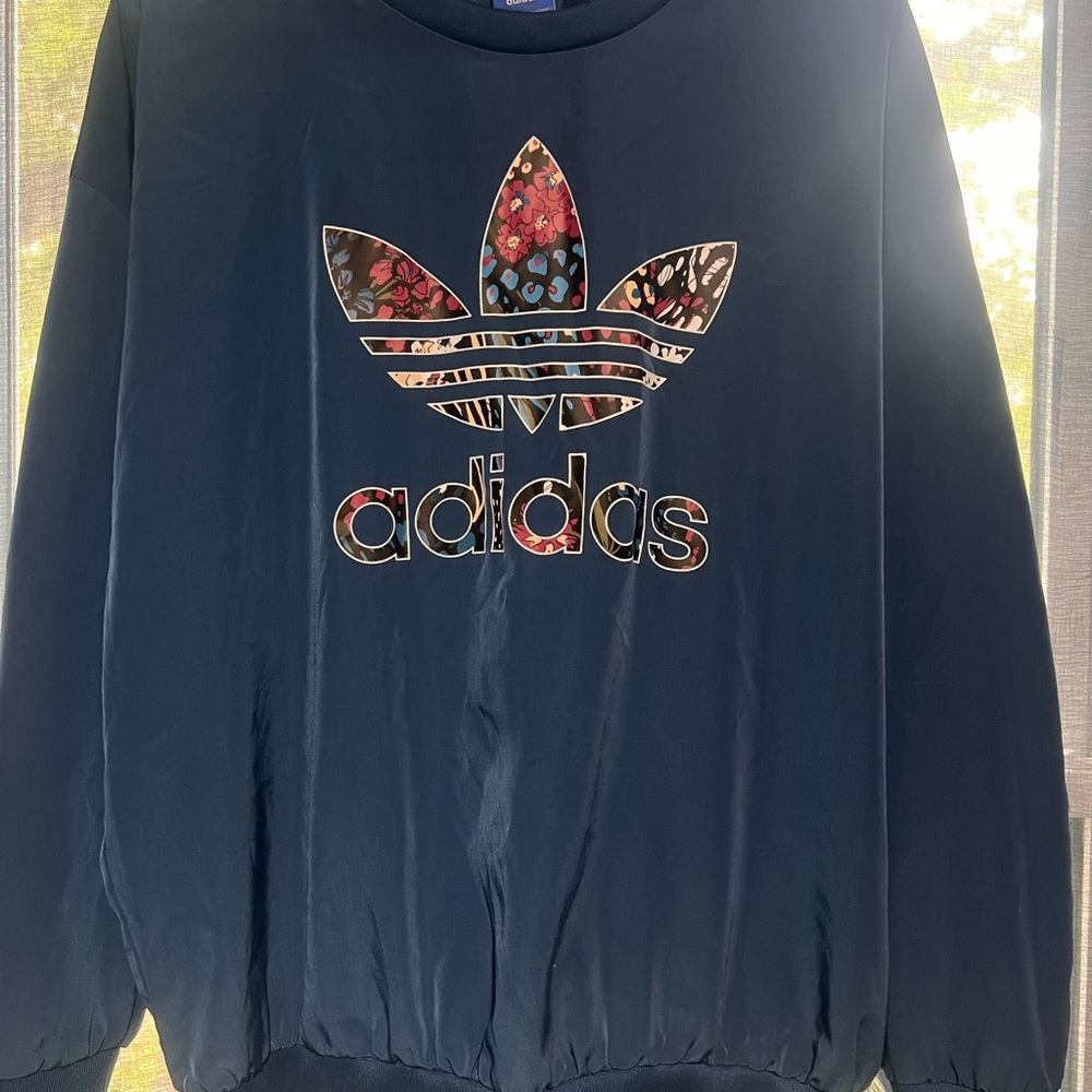 adidas Navy flowy pullover with Floral Trefoil Logo